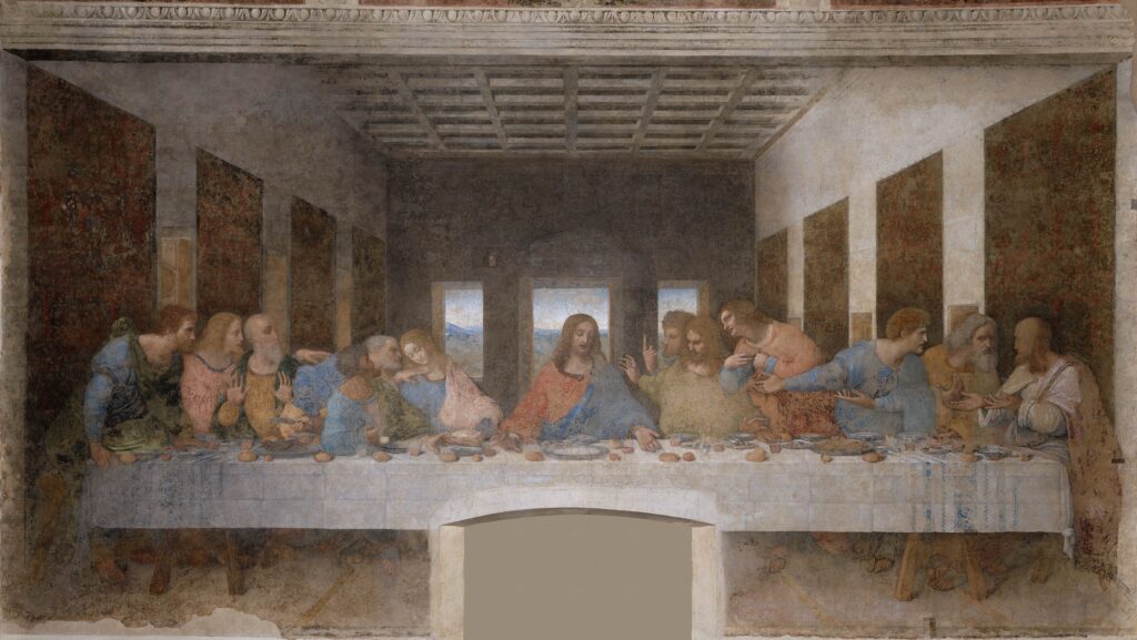 An image of Jesus and the 12 disciples sitting at a table, having the Last Supper