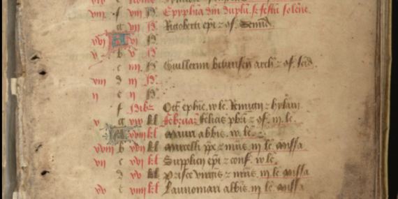 a medieval calendar page, lines written in red and black