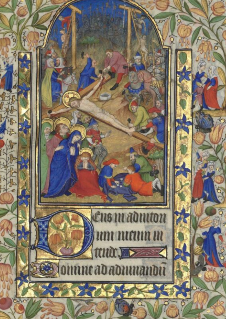 Jesus being nailed to the cross with a crowd around